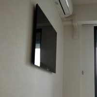 東京都  中央区にて 55型壁掛けテレビ  コンセント増設工事のサムネイル